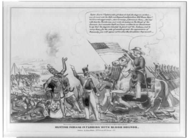 Schwarzes und weißes Foto einer Gruppe von Menschen, einige zu Pferde, mit einer Fahne im Hintergrund und Text, der unten 'Indians jagen in Florida mit Bluthunden' lautet.