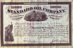 Ein altes Aktienzertifikat der Standard Oil Company, das ein Gebäude und den Text "Standard Oil Company" zeigt.