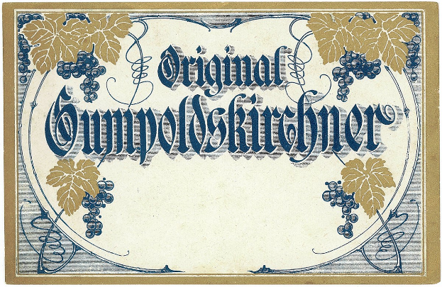 Altes deutsches Wein-Etikett mit einer Illustration von Trauben und Blättern und einem Text, der den Wein-Typ angibt.